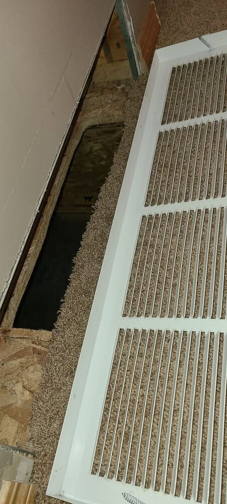 The same return grille spotless after cleaning