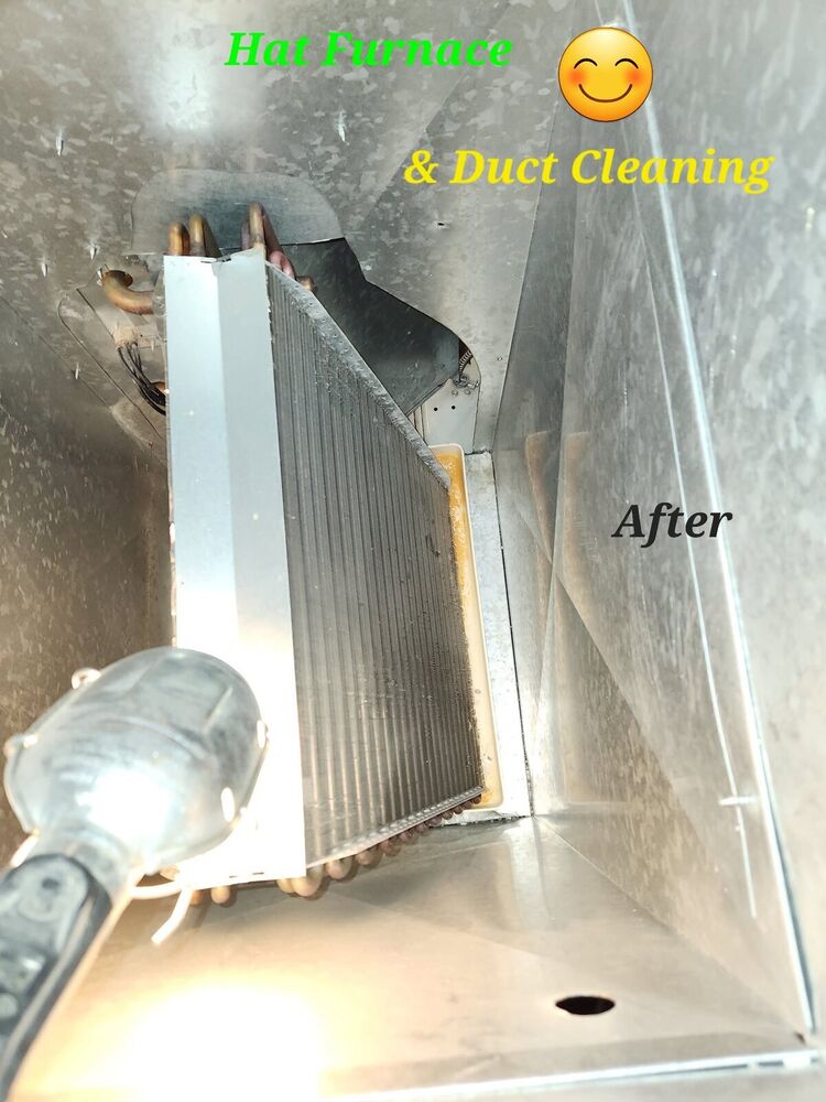The same A-coil after cleaning, fins clear and the galvanized plenum walls shining