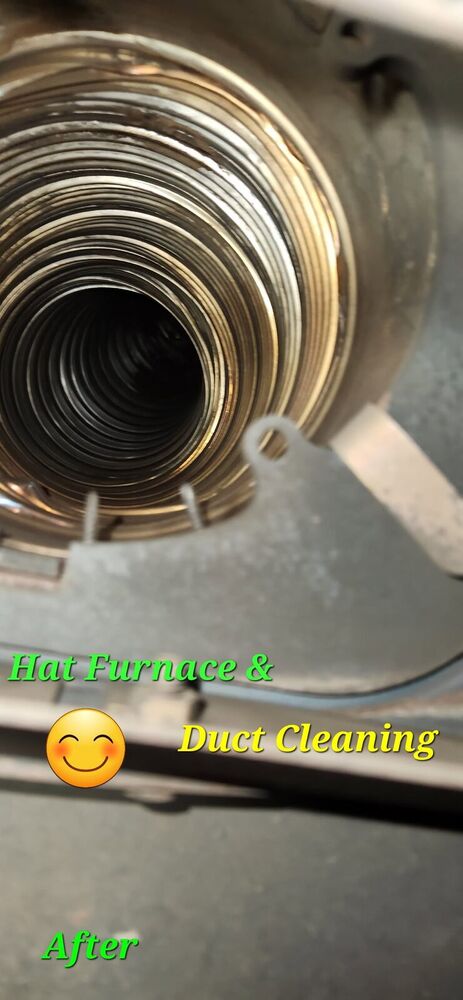 The flue duct gleaming clean after cleaning, spiral ribs shining